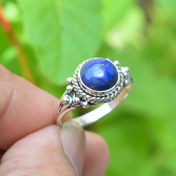 A Three Stone Garnet Ring with... - John Fitzgerald Jewellers | Facebook