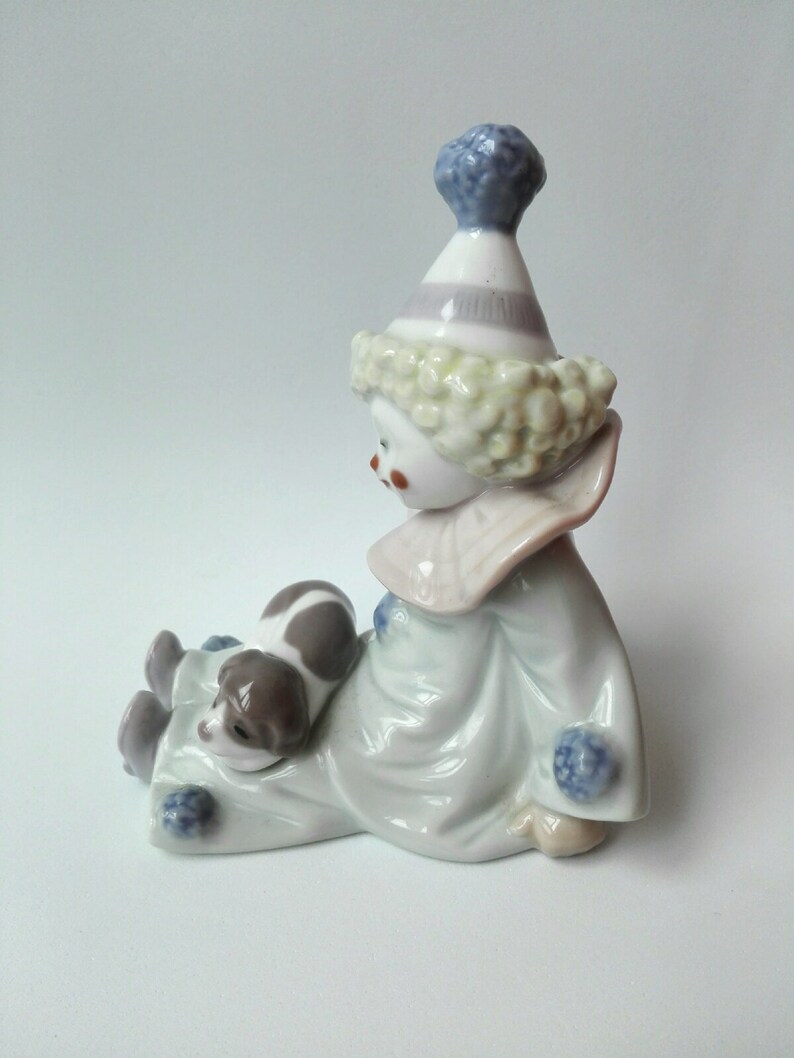 lladro pierrot with puppy