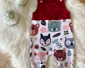 Beautiful romper for girls, two-tone jersey in red and with animal motif