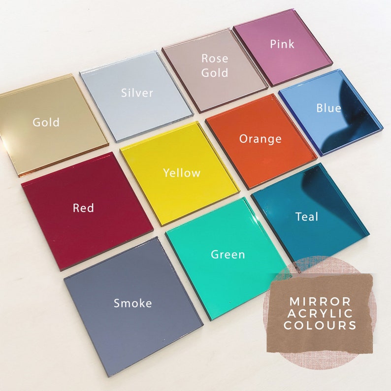 May include: A collection of 12 square mirror acrylic sheets in various colors, including gold, silver, pink, rose gold, blue, orange, red, yellow, green, teal, and smoke. The text "MIRROR ACRYLIC COLOURS" is written on a brown paper tag.