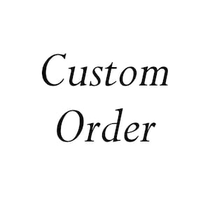 May include: Black text on a white background reads "Custom Order" in a cursive font. The word "Custom" is in a smaller font size than the word "Order".