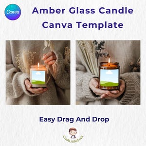 May include: A person is holding a brown glass candle with a white label that has a green field and a blue sky with a white cloud. The candle is lit and the flame is visible. The candle is in the center of the image and the person's hands are visible on either side of the candle.