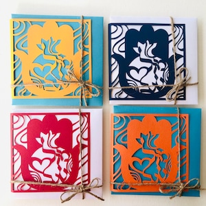 HAMSA: MAZAL TOV (2). Collectie van drie (van vijf) wenskaarten met envelop.