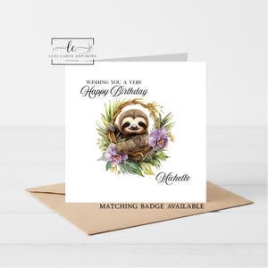 May include: A square greeting card featuring a watercolour illustration of a brown sloth inside a circular vine wreath surrounded by green leaves and purple orchid flowers. The text reads WISHING YOU A VERY Happy Birthday and Michelle.