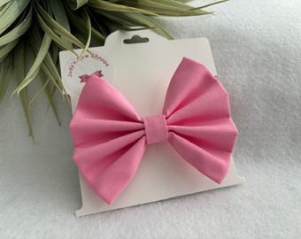 Lazo de tela rosa para el pelo