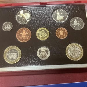 2004 Première locomotive de deux livres et premier kilomètre de 4 minutes, 50 pence de qualité BE, pièce de la Monnaie royale de Grande-Bretagne, série de pièces avec certificat