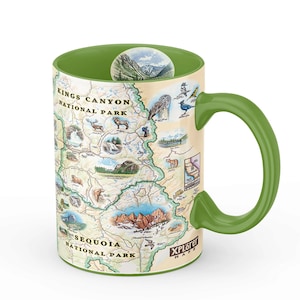 May include: Green ceramic mug with a map of Kings Canyon and Sequoia National Parks. The map features illustrations of animals, plants, and landmarks. The mug has a green handle and the text "XPLORER MAPS" on the bottom.