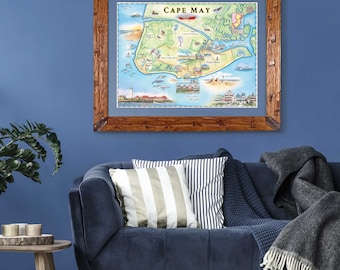 Może przedstawiać: Mapa Cape May, New Jersey, w ramie z rustykalnego drewna. Mapa jest ilustrowany kolorowymi szczegółami, w tym latarnią morską, plażą i domami. Tytuł "Cape May" jest nadrukowany na górze mapy kolorem czerwonym.