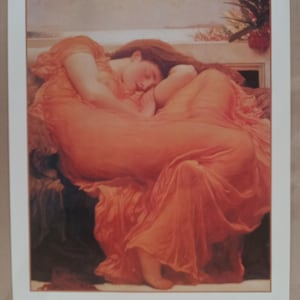 May include: A painting of a woman in a flowing orange dress, sleeping with her head resting on her arm. The painting is titled "Flaming June" by Frederick Lord Leighton.