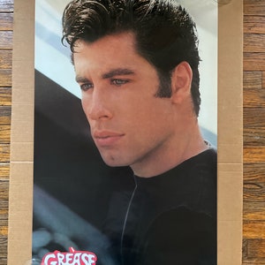 Póster vintage de la película Grease, foto de perfil de John Travolta