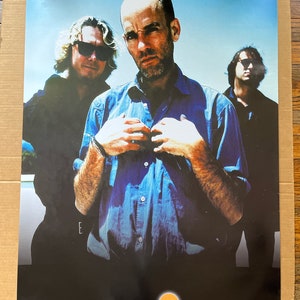 MOVIMIENTO RÁPIDO DEL OJO. cartel vintage grupo musical fotografía estilo década de 1990