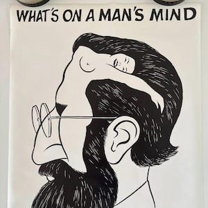 May include: Black and white poster with the text "WHAT'S ON A MAN'S MIND" at the top. The illustration depicts a man's head with a woman's silhouette inside. The man wears glasses and has a beard. The woman is nude.