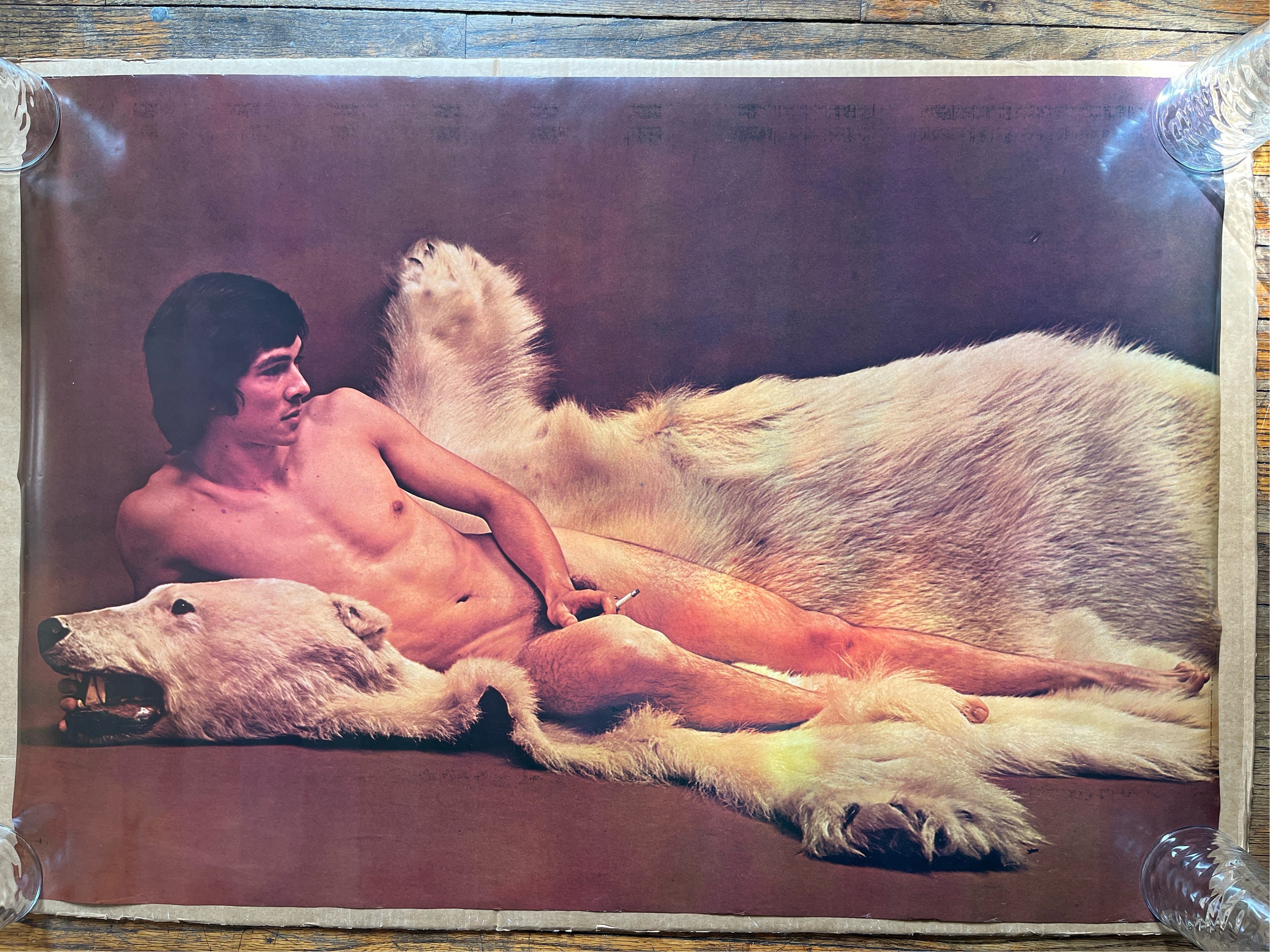 Buy Man Laying on Bear Rug W Cigarette Vintage Poster Not Burt Reynolds  Online in India - Etsy
