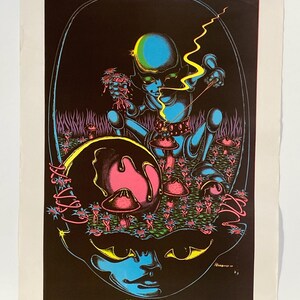 May include: A blacklight poster with a psychedelic illustration of a blue alien figure with a yellow halo, sitting on a large pink and black mushroom. The alien is holding a string with a glowing yellow end. The alien is surrounded by smaller pink and black mushrooms. The poster has the text "Mom Flowers" at the bottom.