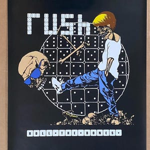 May include: Black poster featuring the band Rush. The artwork depicts a skeletal figure kicking a skull wearing sunglasses. The words "RUSH" and "ROLL THE BONES" are displayed in white block letters. The background is a black canvas.