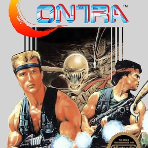 May include: A video game cartridge for the Nintendo Entertainment System, featuring a red, yellow, and blue title card that reads "Contra" with a stylized alien creature in the background. The cartridge is licensed by Nintendo and features a seal of approval from Nintendo.