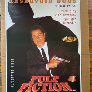 cartel vintage de ficción pulp promocional John Travolta Hitman