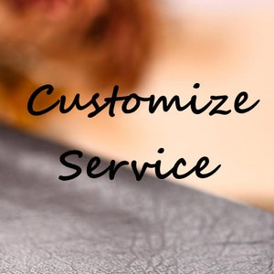 May include: A graphic featuring the black text Customize Service in a cursive font. The background consists of a blurred, warm-toned upper section and a textured, dark gray lower section that appears to have a leather-like grain pattern.