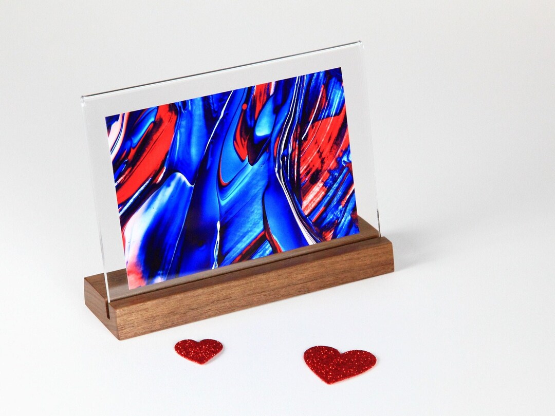 Floating Picture Frame Holds Any 5x7 or Smaller Photo. Heavy Clear