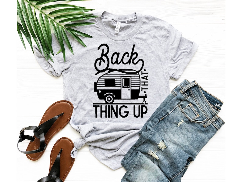 May include: A gray t-shirt with a black graphic of a camper van and the text "Back That Thing Up".
