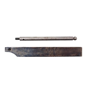 May include: Two metal components on a white background. One is a long, rectangular piece with a curved edge and a hole. The other is a cylindrical rod with a threaded end, a small hole, and a ball-shaped end. Both pieces have a silver finish.