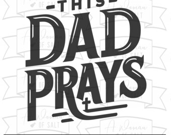 May include: Black and white graphic design with the text "This Dad Prays" in a bold, stylized font. The word "Prays" is underlined with a line that has a cross at the end.