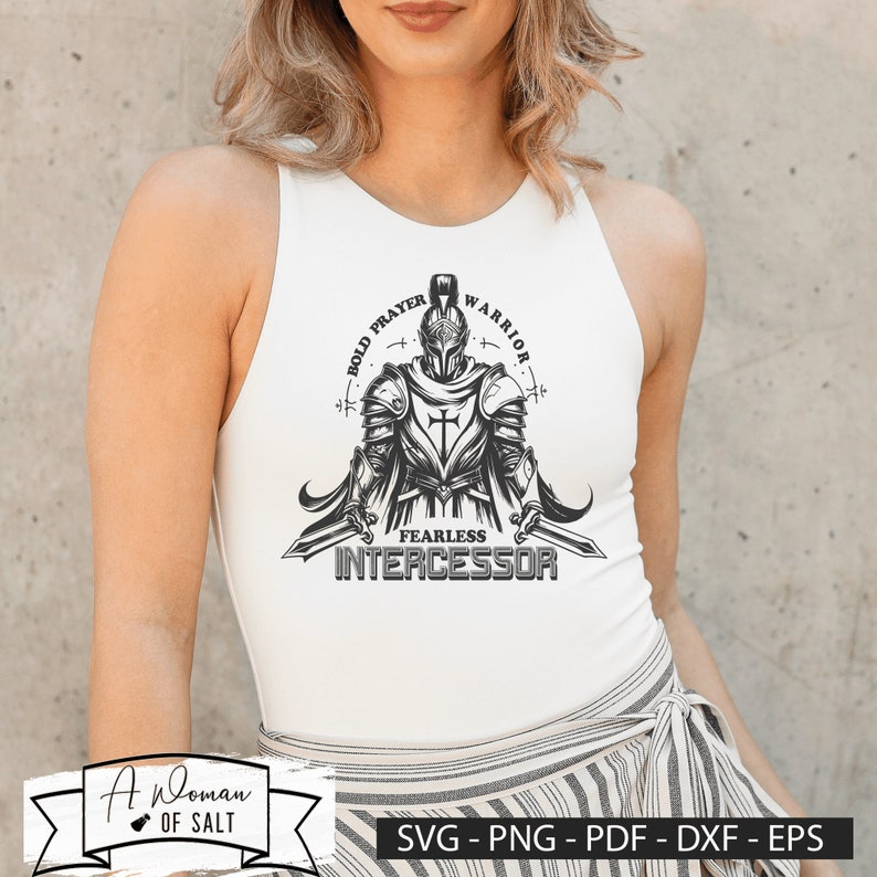 May include: A black and white graphic design of a knight in armor holding two swords. The knight is wearing a helmet with a cross on his chest. The text around the knight reads "Bold Prayer Warrior" and "Fearless Intercessor".
