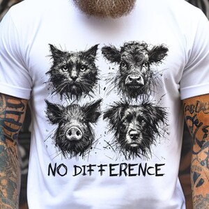 May include: White t-shirt featuring a black and white graphic design of four animal faces: a cat, a cow, a pig, and a dog. The text "NO DIFFERENCE" is printed below the animal faces.