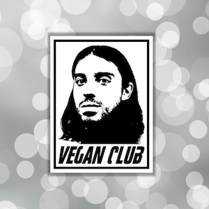 May include: Black and white sticker with a portrait of a person with long hair and a beard. The text "VEGAN CLUB" is printed below the portrait.