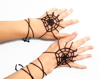Hand made spider-web gloves. Perfect for a halloween costume.
