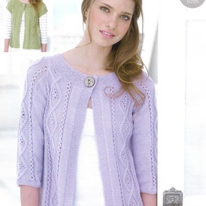 May include: A light purple knitted cardigan with a cable knit pattern and a single button closure. The cardigan is shown on a model wearing a white shirt and a floral skirt. The text "COUNTRY STYLE DK 9166 81/86 - 132/137cm 32/34 - 52/54" is visible in the top right corner of the image. The text "Includes larger sizes" is visible in the bottom right corner of the image.