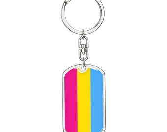 May include: A silver keychain with a pink, yellow, and blue striped dog tag. The dog tag is a symbol of the pansexual pride flag.