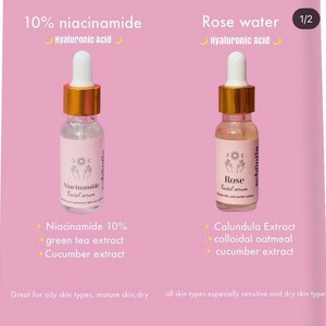 May include: Two small glass serum bottles with white droppers and gold collars are displayed against a pink background. One is labeled "10% niacinamide" and the other "Rose water." Both include "Hyaluronic Acid." The labels list ingredients and the brand name.