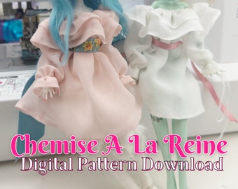 May include: Two dolls wearing white and pink dresses with ruffled collars and sleeves. The text "Chemise A La Reine Digital Pattern Download" is at the bottom of the image.