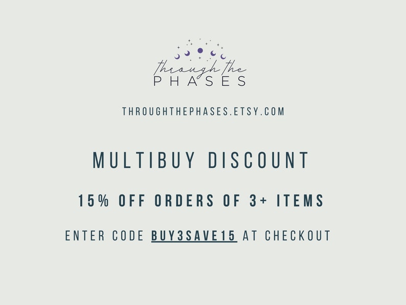 May include: A graphic with a purple moon and stars logo for a shop called "Through the Phases". The text "MULTIBUY DISCOUNT" is in black, and the text "15% OFF ORDERS OF 3+ ITEMS" is in black. The text "ENTER CODE BUY3SAVE15 AT CHECKOUT" is in black.