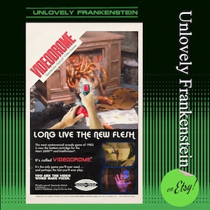 May include: A vintage video game advertisement for Videodrome, a controversial arcade game from 1983. The ad features a television set with a grotesque, fleshy mass spilling out of it. The text reads "Long Live the New Flesh" and "It's called Videodrome."