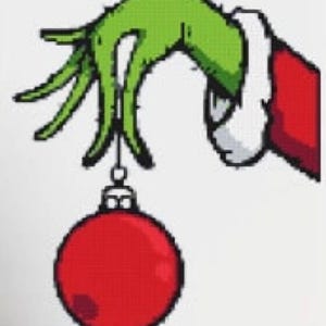May include: A pixelated illustration of a green hand, wearing a red and white sleeve, holding a red Christmas bauble. The hand is reaching down to hold the bauble, which is hanging from a silver hook. The image is on a white background.