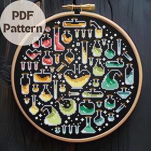 May include: Cross-stitch pattern featuring various potion bottles and lab equipment in shades of red, yellow, green, and blue on a black background. The design is set within a wooden embroidery hoop. Text in the upper left corner reads "PDF Pattern".