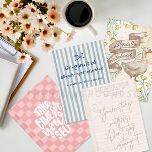May include: An overhead shot of notebooks with various designs and text, including "Organized," "Take Time for Yourself," and "dilly dally notebook." A cup of coffee and flowers are also present, creating a visually appealing arrangement.