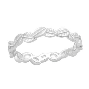 May include: A silver ring with a delicate design of leaves around the band. The ring is marked with "925" on the inside.