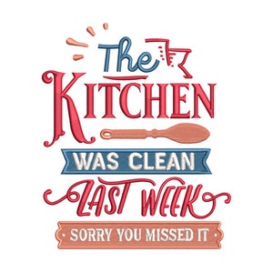 May include: Embroidered kitchen sign with the text "The Kitchen Was Clean Last Week, Sorry You Missed It." The design features red, blue, and peach-colored lettering and a wooden spoon illustration.