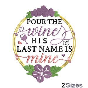 May include: A round embroidery design with a gold circle and purple flowers. The text inside the circle reads "Pour the wine, his last name is mine".