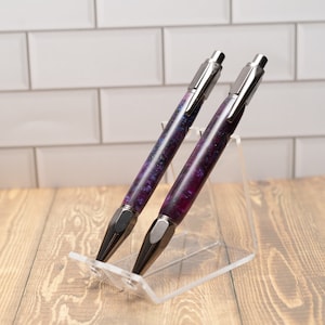 Stylo clic sur le thème de la galaxie spatiale