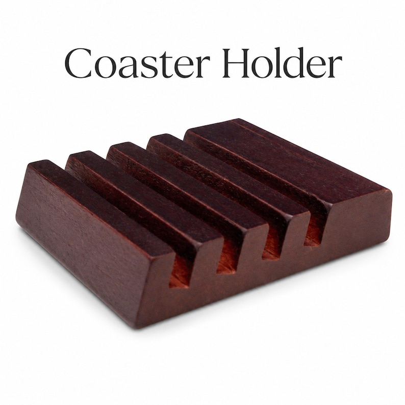 A dark brown wooden coaster holder with four slots, and the text "Coaster Holder" above it.