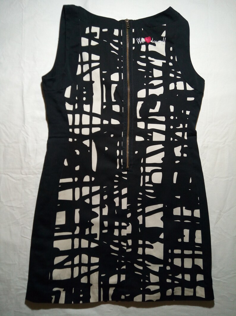 Desigual beautiful women cotton dress with embroidery.Lining with images.Size 42.
