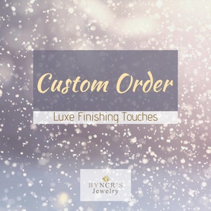 May include: A light purple background with a white rectangle containing the text "Custom Order" and "Luxe Finishing Touches". The background is covered in small white dots. The bottom of the image contains a white rectangle with the text "BYNCR'S Jewelry".