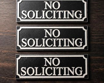 Doorbell quantity 3 | no soliciting sign | black with white lettering | no solicitation