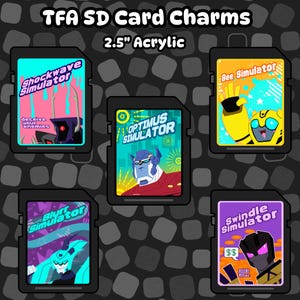 May include: Five acrylic SD card charms, each 6.35 cm in size, with cartoon character designs. The charms feature characters and text including "Shockwave Simulator", "Optimus Simulator", "Bee Simulator", "Blurr Simulator", and "Swindle Simulator".