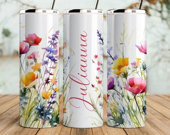 May include: Three white stainless steel tumblers with a floral design and the name "Julianna" on the middle tumbler.