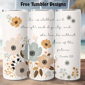 May include: White tumbler with floral design in beige, light blue, and brown. The tumbler has the text "She is clothed with strength and dignity, and she laughs without fear of the future. Proverbs 3:25."
